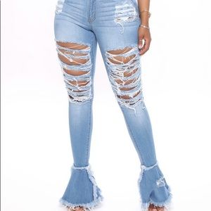 Akira light blue wash denim ripped flare jeans